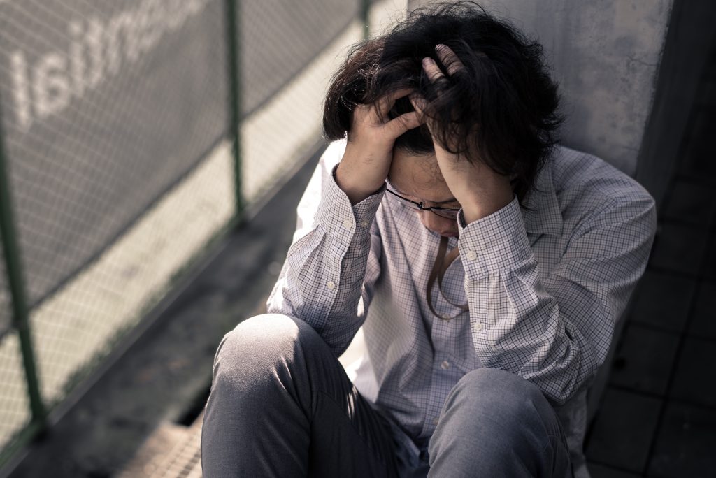 man experiencing depression and anxiety