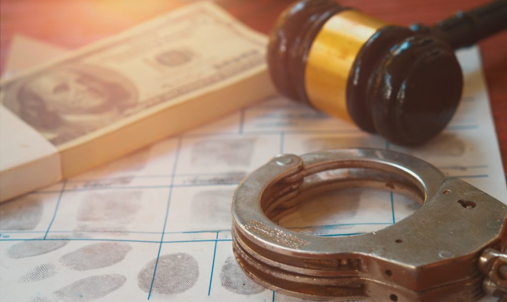 money, gavel, crime evidence, handcuffs